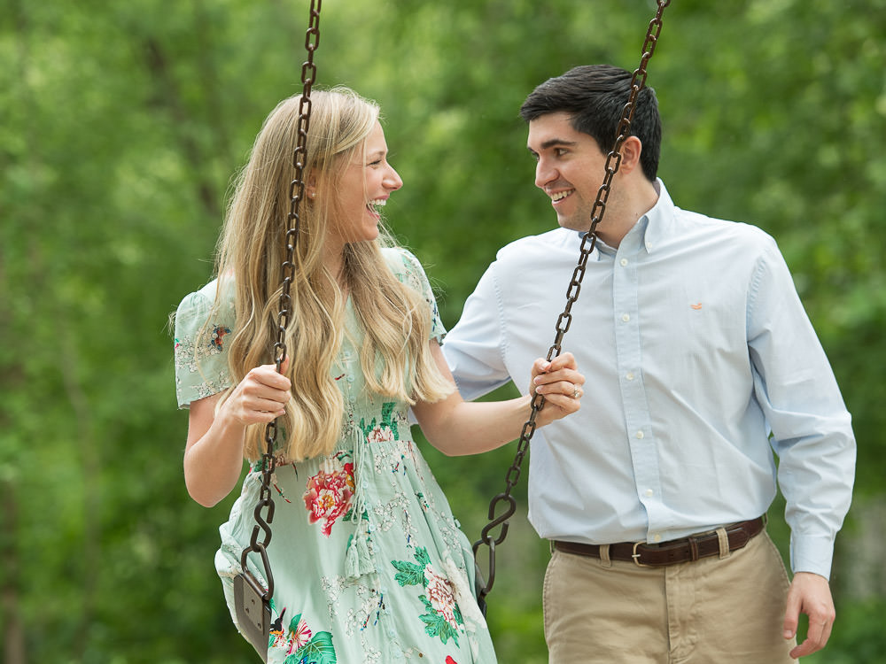 Caitlin and Ben on the Swings during their engagement session at Patapsco State Park