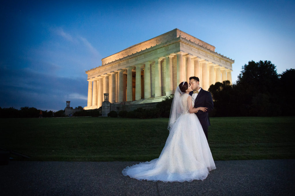 Lisa and Julien kiss at Sunset at the Lincoln Memorial Washington DC