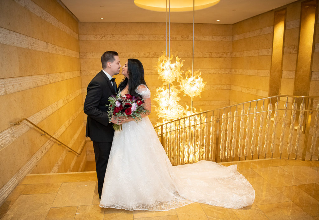 Marissa and Sean kiss right after their first look at the Four Seasons Baltimore