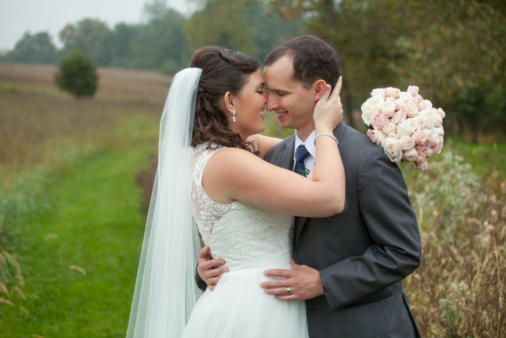 Meaghan and Andrew kissing at their reception at Glen Ellen Farm Ijamsville, Maryland