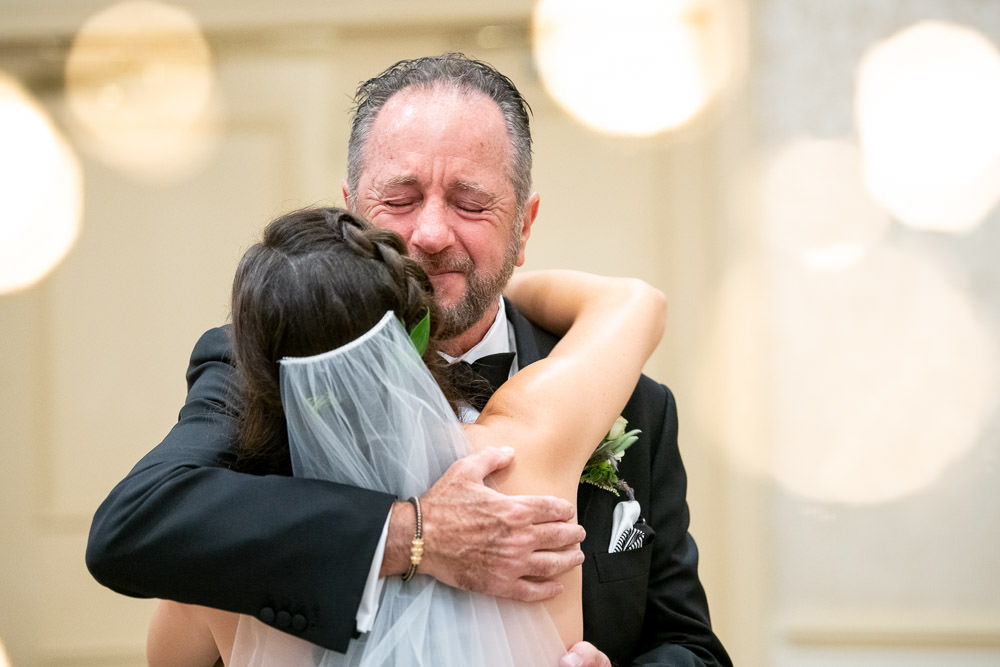 Darian and her father see each other for the first time at Woodholme Country Club